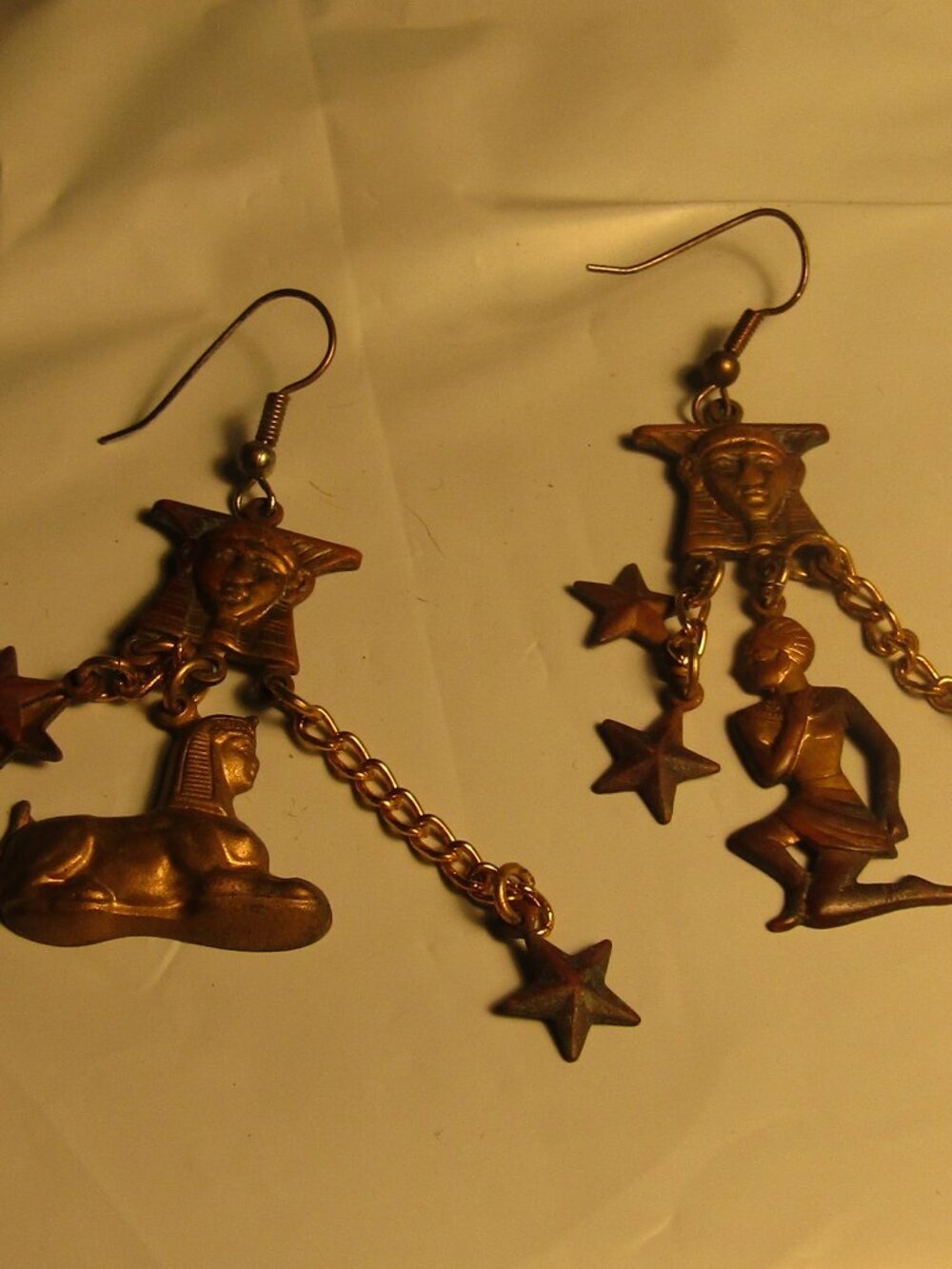 Vintage LONG DANGLE BRASS EGYPTIAN Pierced Earrings sphynx Pharoah Stars etc